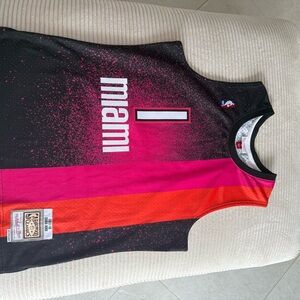 Mitchell & Ness Miami Basketball Jersey in Pink, Orange, and Black